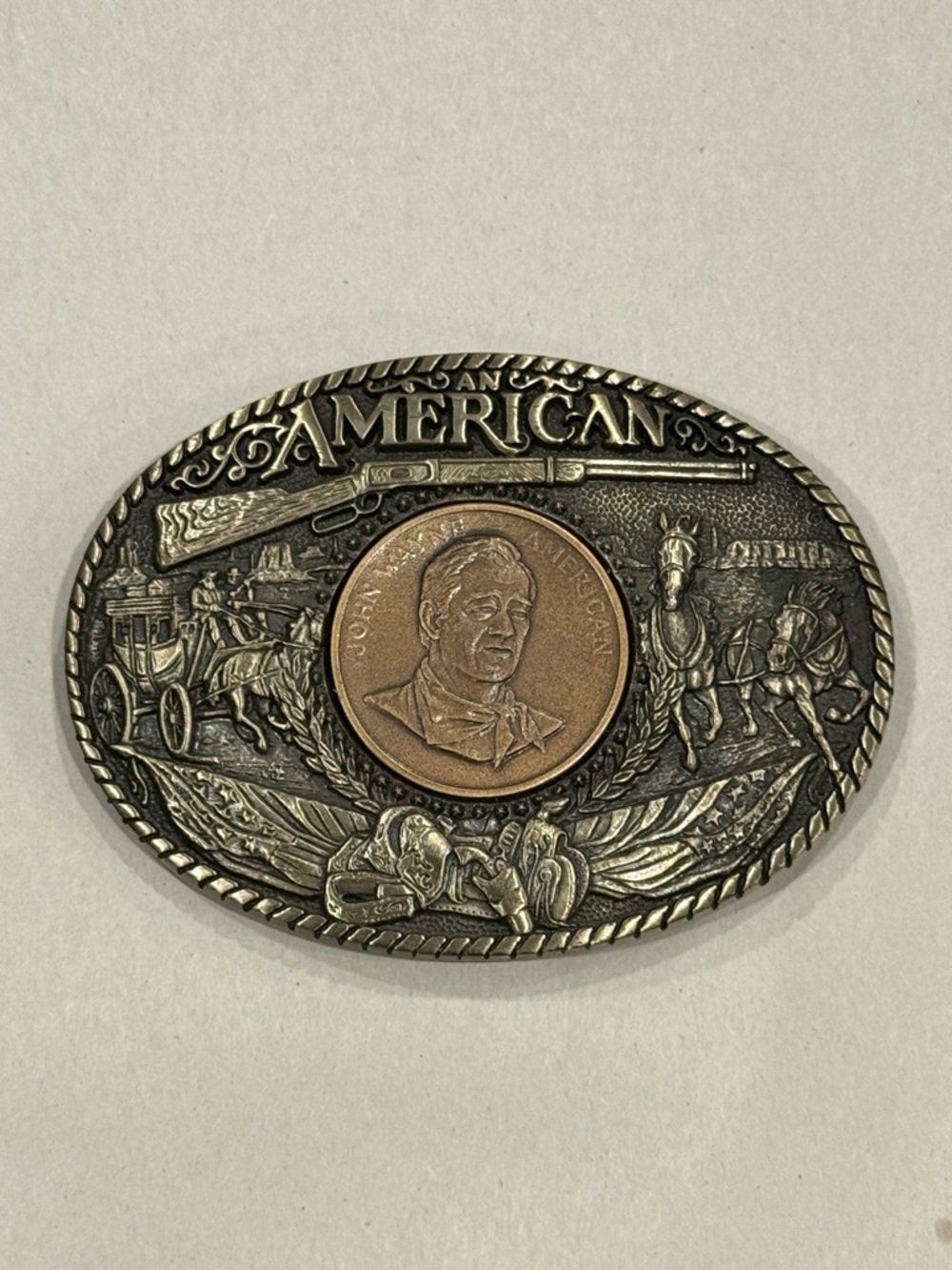 WA19140 NOS VINTAGE 1980s JOHN WAYNE - AN AMERICAN SOLID BRASS BELT BUCKLE